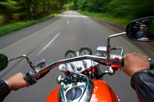 Man riding motorcycle in first person view